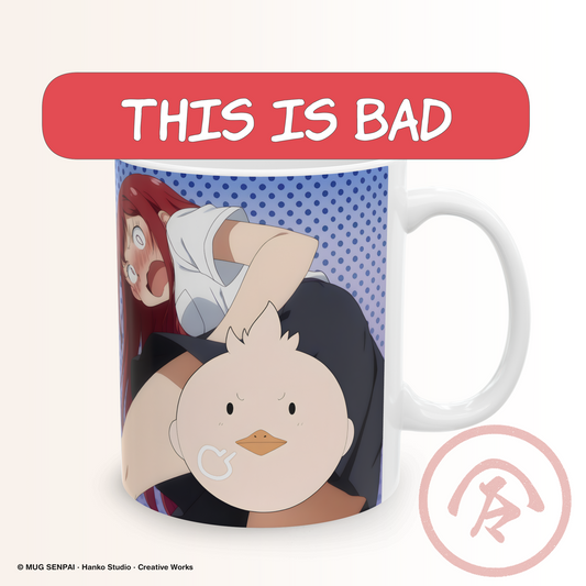 Anime meme mug featuring a blushing panic anime girl with wide shocked eyes and exaggerated expression, holding a round bird in a chaotic comedic scene. The background has a blue dotted pattern, adding to the playful manga-style humor. The design captures a relatable moment of embarrassment and confusion, paired with a bold “this is bad” style energy that reflects sudden panic and meme-worthy anime reactions.