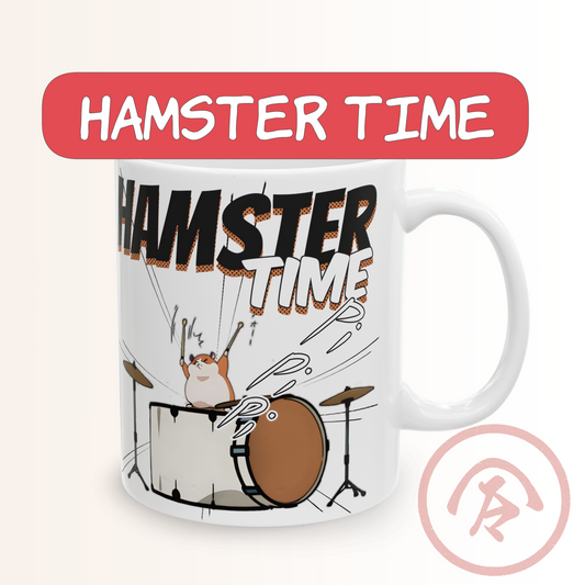 Hamster meme mug featuring a tiny kawaii hamster drumming wildly on a full drum set in a manga-style scene. Bold “HAMSTER TIME” text explodes above the character while energetic sound effects and motion lines emphasize the chaotic rhythm. The design mixes cute animal humor with dynamic comic-panel energy, creating a playful and loud aesthetic on a white ceramic mug.